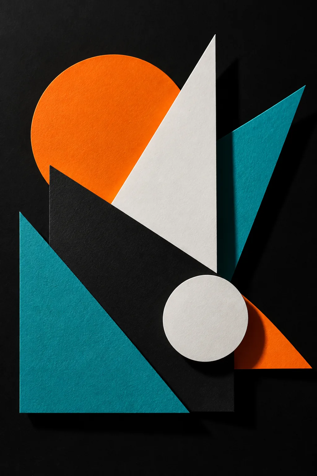 Illustration of bold geometric paper shapes layered on a card-maker's desk